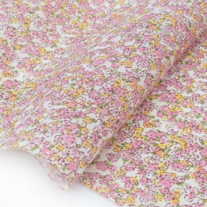 Tissu coton fleuri rose jaune fond écru x 50cm 