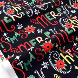 Tissu américain Thème Noël multicolore fond noir x 0.5cm 