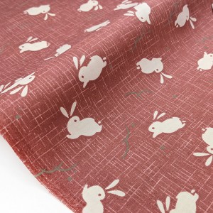 Tissu japonais coton traditionnel lapin fond brique x 50cm 