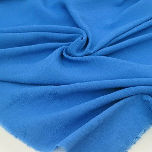 Destock 0.9m tissu crêpe de cupro soyeux extra-doux fluide bleu largeur 143cm
