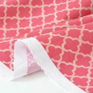 Tissu américain fine toile de coton doux souple géométrique chiné rouge pastel x50cm 