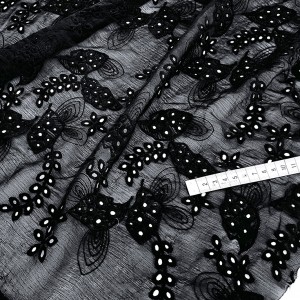 Destock 0.8m tissu broderie anglaise mousseline crépon brodé doux fluide noir largeur 135cm 