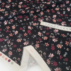 Destock 1m tissu jersey coton imprimé fleuri fond noir largeur 180cm