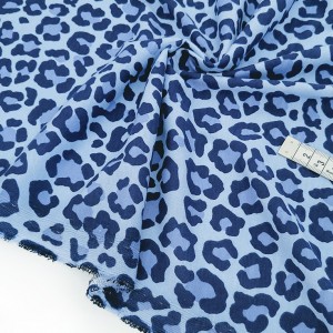 Destock 1.65m tissu jersey coton imprimé léopard bleu largeur 180cm
