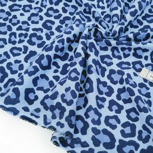 Destock 1m tissu jersey coton imprimé léopard bleu largeur 180cm