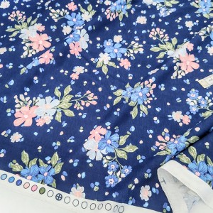 Destock 1.75m tissu jersey coton imprimé fleuri fond bleu largeur 178cm