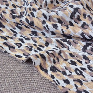 Tissu mailles tricot polyester imprimé léopard x 50cm