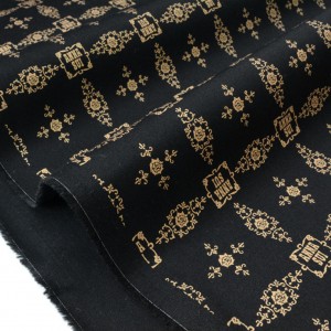 Tissu américain gabardine coton vintage doré fond noir x 50cm 