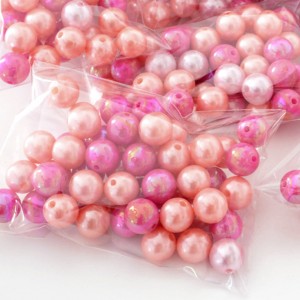 Lot de 50 grosse perles en plastique taille 1cm ton rose pour création 