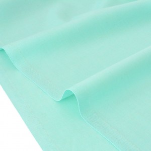 Tissu pure laine vierge extra-fin fluide couleur vert glacier x 50 cm 