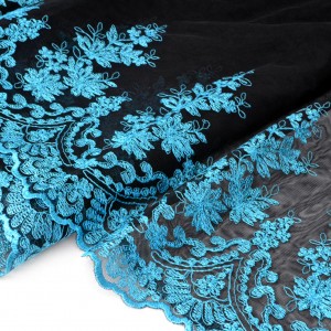 http://www.aliceboulay.com/8590-24522-thickbox/tissu-haute-couture-tulle-brode-broderie-festonnes-fluide-turquoise-noir-x-50cm.jpg