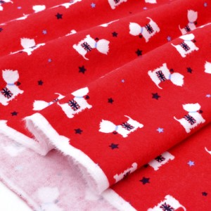Tissu américain flanelle coton extra-doux petit chien fond rouge x 50cm 