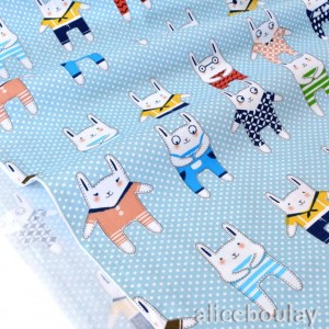 Destock 2.55m tissu percale coton jolis lapins fond bleu largeur 162cm