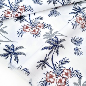 Destock 1.3m gabardine de lin stretch imprimé motifs végétaux exotiques fond blanc largeur 150cm