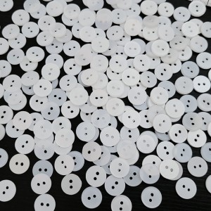Destock 200 boutons en résine blanc ou blanc translucide taille 11 mm