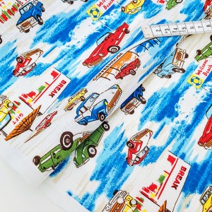 Destock 0.96m tissu japonais coton dobby motif voiture fond bleu blanc largeur 116cm