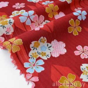 Tissu japonais traditionnel fleuri flèches fond rouge brique x50cm 